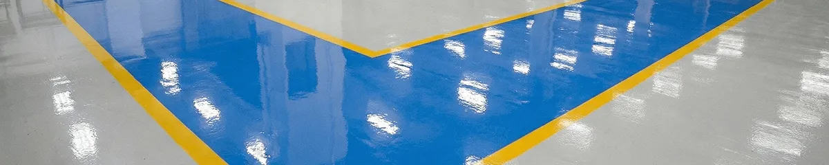 A factory floor professionally covered and marked with epoxy flooring in Atlanta, GA