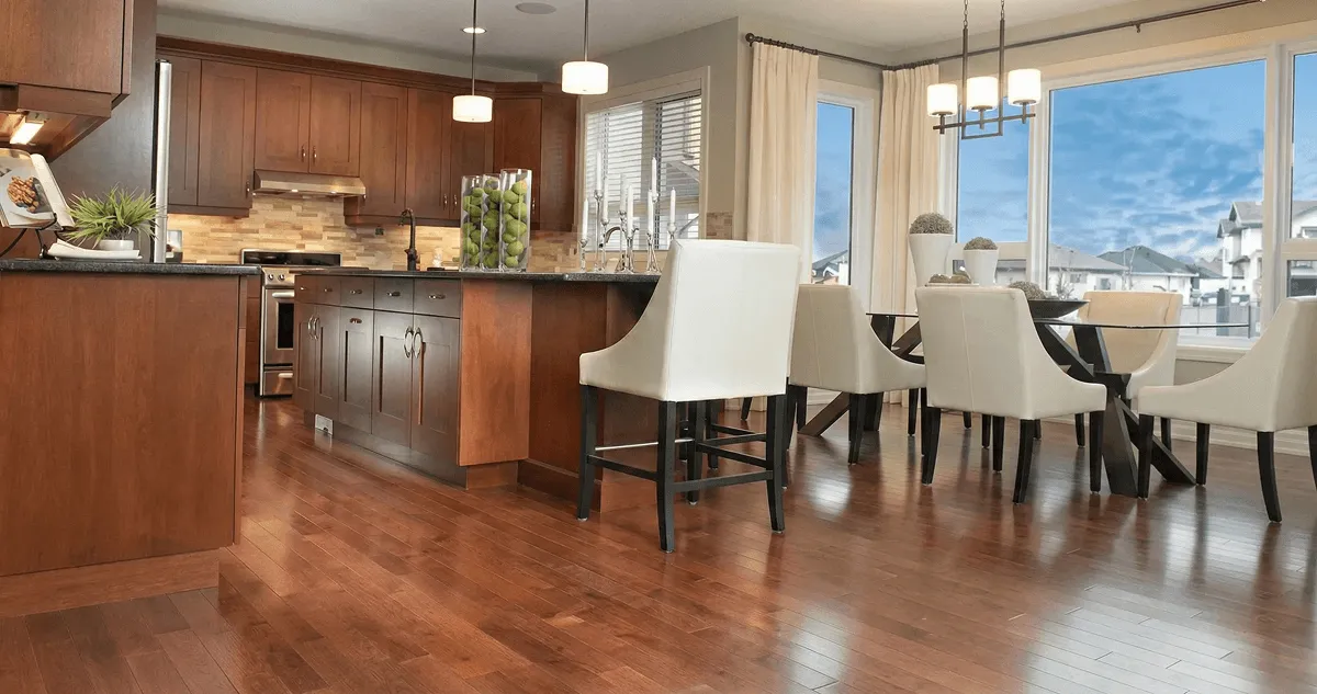 A modern kitchen with professionally installed wood flooring in Atlanta, GA